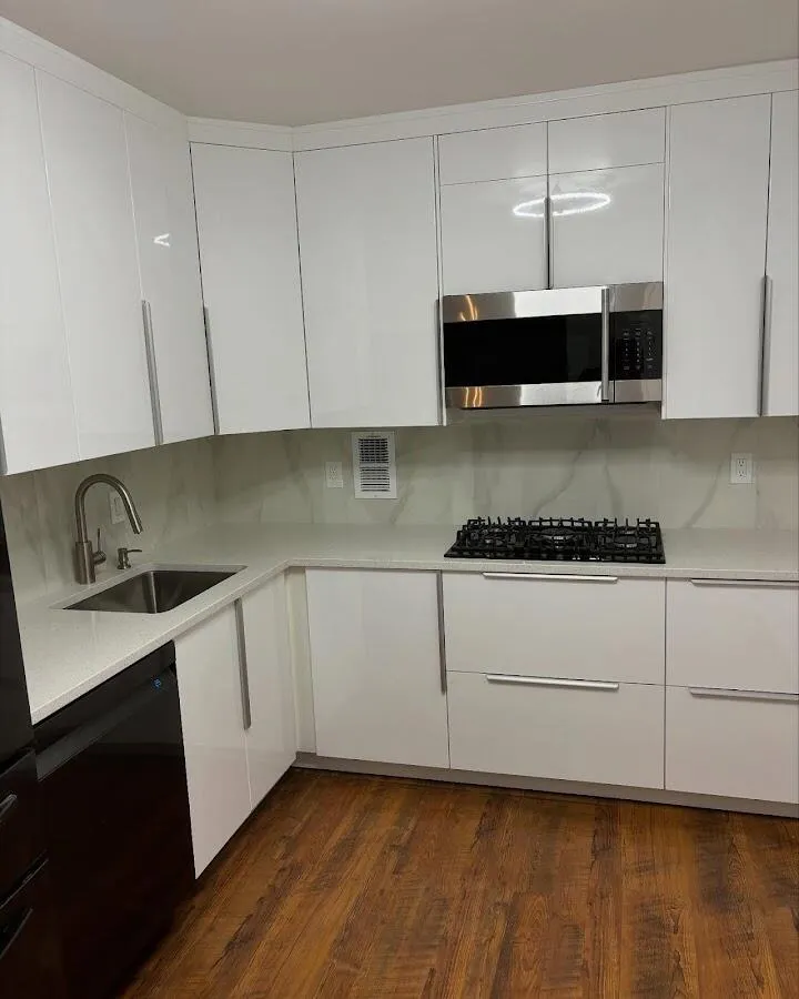 Restored kitchen with white cabinets after water damage in Dade City